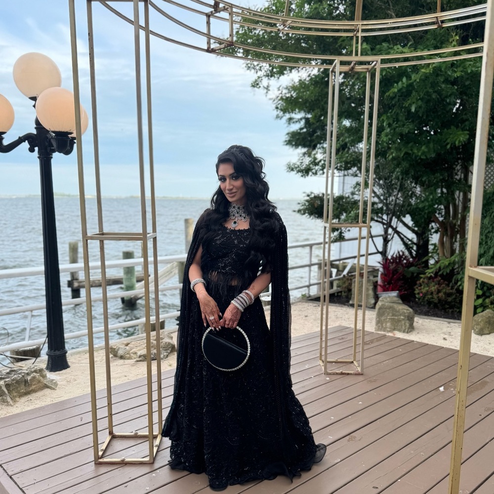 Black embellished lehenga saree two piece with feathers and ruffle bridesmaid